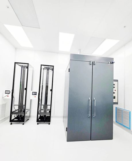 Hydrophilic coating towers beside a large stainless double-door lamination and reflow oven