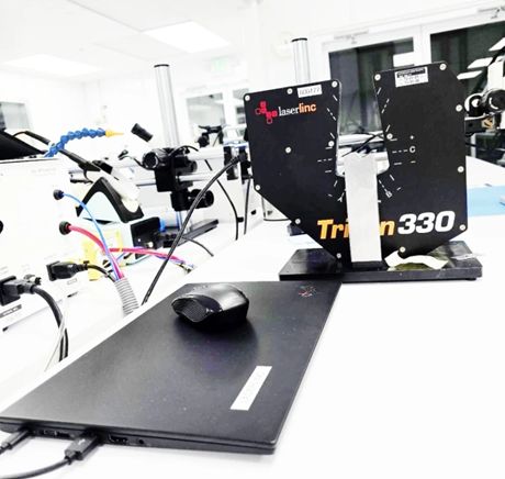 LaserLinc Triton 330 non-contact laser micrometer at a cleanroom bench